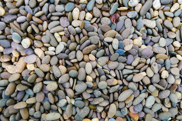 pebble beach stone background, smooth stone texture