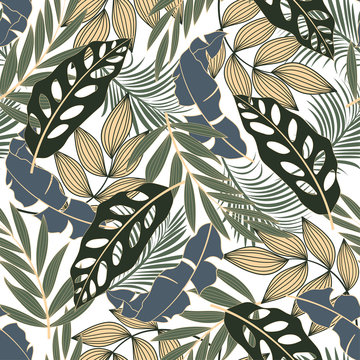Trend seamless tropical pattern with bright green and yellow plants and leaves on a white background. Beautiful print with hand drawn exotic plants. Exotic jungle wallpaper.