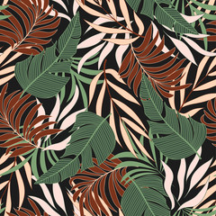 Abstract seamless tropical pattern with bright Burgundy and green plants and leaves on a dark background. Seamless exotic pattern with tropical plants. Tropic leaves in bright colors.