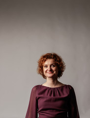 Happy red-haired woman. Good vibes.