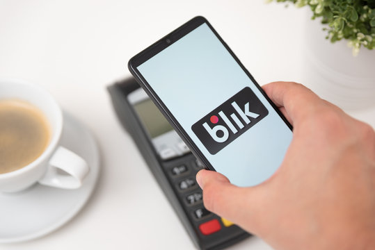 Phone with Blik logo, contactless payment service