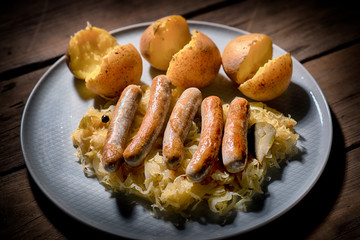 Sauerkraut and sausages with  jacket potatoes