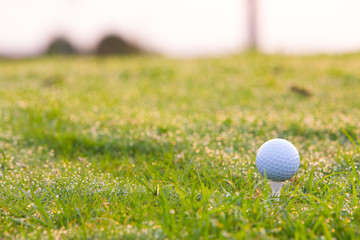 Golf ball on tee ready to be shot