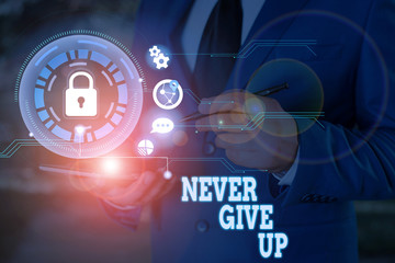 Writing note showing Never Give Up. Business concept for Keep trying until you succeed follow your dreams goals