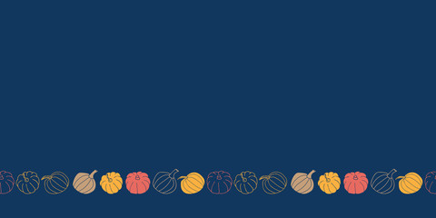 Vector border with colorful pumpkins on dark blue background. One of the 