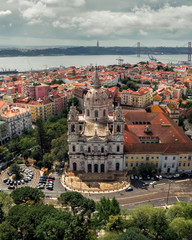 Naklejka na ściany i meble cityscape lisbon, basilica lapa estrela portugal panorama, weather european city