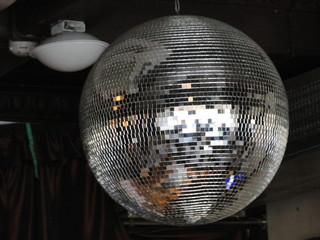 disco mirror hanging on the ceiling in the room