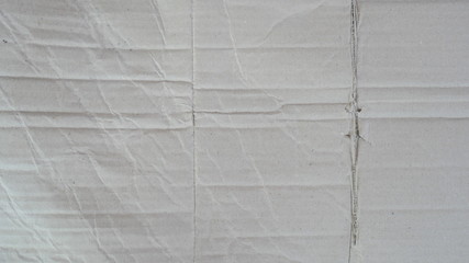 texture of crumpled paper cardboard background, used cardboard box