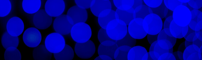 Abstract  dark blue bokeh. Background blur, banner..Holiday lights