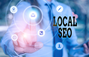 Writing note showing Local Seo. Business concept for optimize your website to rank better for a local audience