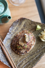Asian Style Beef Tartare with Pan-Fried Rice Cake and Black Truffle