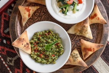 Middle Eastern Assorted Cold Appetizers, Meze. Tabbouleh and Spinach with Yogurt