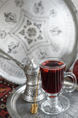 Warm Pomegranate Mulled Wine with Honey. Winter Beverage.