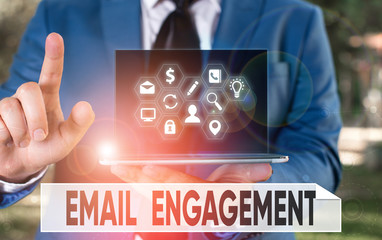 Conceptual hand writing showing Email Engagement. Concept meaning measure how subscribers engage in...