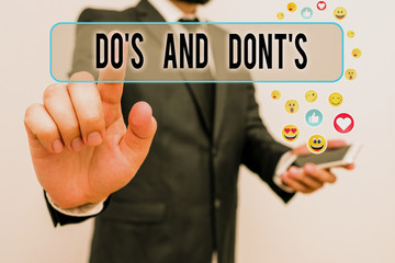 Handwriting text Do S Is And Dont S Is. Conceptual photo advising Rules or customs concerning some...