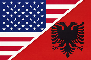 USA vs Albania national flag from textile. Relationship between american and european countries.