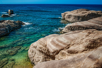 Fototapeta na wymiar Kantarkasti (Sea Caves) is an amazing miracle of nature on the west coast of Cyprus. 