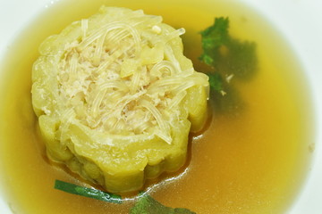 boiled bitter melon stuffed minced pork and glass noodles soup on bowl