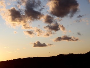 Fototapeta premium The clouds over the landscape in a evening sky.