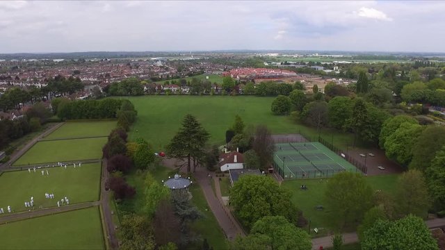 Flight over trees in a park Bowles and tennis