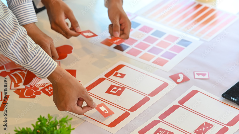 Wall mural ux ui concept, closeup team of development software mobile working with design workspace.