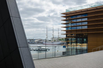 SEAPORT - Sailing ship and yachts moored at the quays