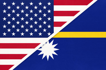 USA vs Nauru national flag from textile. Relationship between american and Oceania countries.