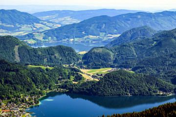 Fototapeta na wymiar Lake and green mountains in Zwolferhorn Austria.
