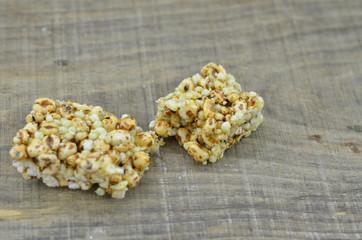 Closeup of cereal flakes on wooden background