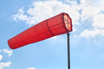 Windsock on blue sky in Industrial Estate, Windsock on blue sky with cloudy at petrochemical plant,...