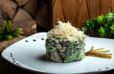 mayonnaise salad topped with grated cheese