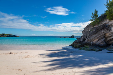 Fototapeta na wymiar Looking out over the ocean from the sandy beach, at Horseshoe Bay on the Island of Bermuda