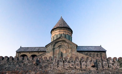 Fototapeta premium old church in Georgia against the blue sky