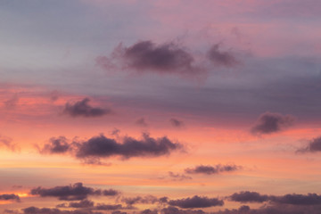 colorful sky at sunset with some clouds