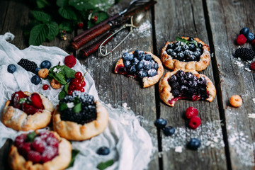 biscuit with berries of blackberry, raspberry, blueberry, black currant, strawberry