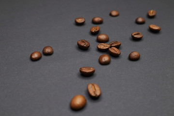  little man with coffee. grain on a dark background.