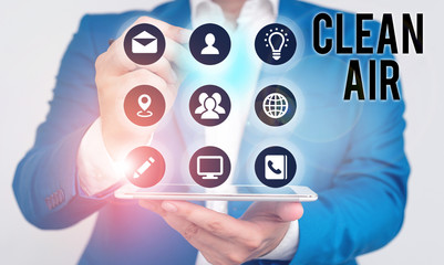 Writing note showing Clean Air. Business concept for air that has no harmful levels of dirt and chemicals in it