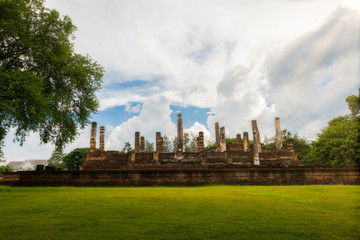 Fototapeta na wymiar Wat Mai, ancient Thai temple made from laterite. Sukhothai Historical Park, UNESCO world heritage.