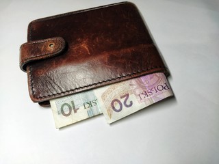 wallet with money isolated on white background