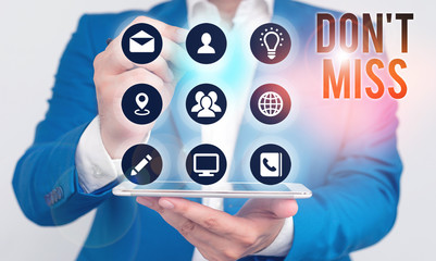 Writing note showing Don T Miss. Business concept for comanalysisding them not to miss out an opportunity or an advantage