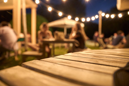 View Of A Wooden Table On The Terrace Of A Bar