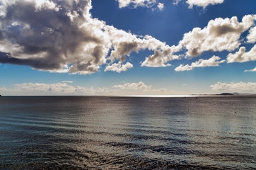 Obraz premium Clouds over the Sea