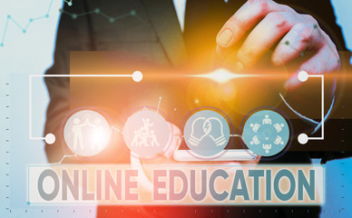 Text sign showing Online Education. Business photo showcasing kind of learning that takes place via the Internet