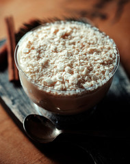 cup of coffee with sugar on wooden table