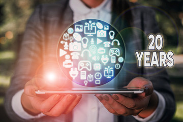 Conceptual hand writing showing 20 Years. Concept meaning Remembering or honoring special day for...