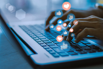 Businesswoman laptop using ,Social, media, Marketing concept . blue tone	