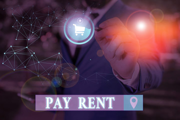 Conceptual hand writing showing Pay Rent. Concept meaning To pay money in exchange for the use of...