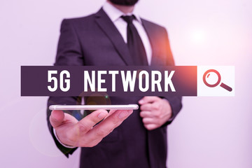 Handwriting text 5G Network. Conceptual photo greatly increase the speed and responsiveness of wireless network Male human wear formal work suit hold smart hi tech smartphone use one hand