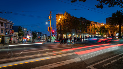 Castro Street with long exposure traffic lights at night, San Francisco, USA