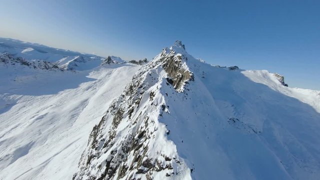 Aerial footage of flying above a mountain